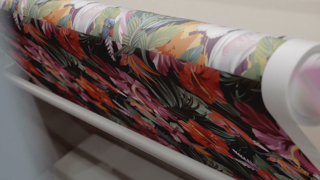 Load video: Sublimation printing service in action – high-quality fabric being printed with vibrant, custom designs.